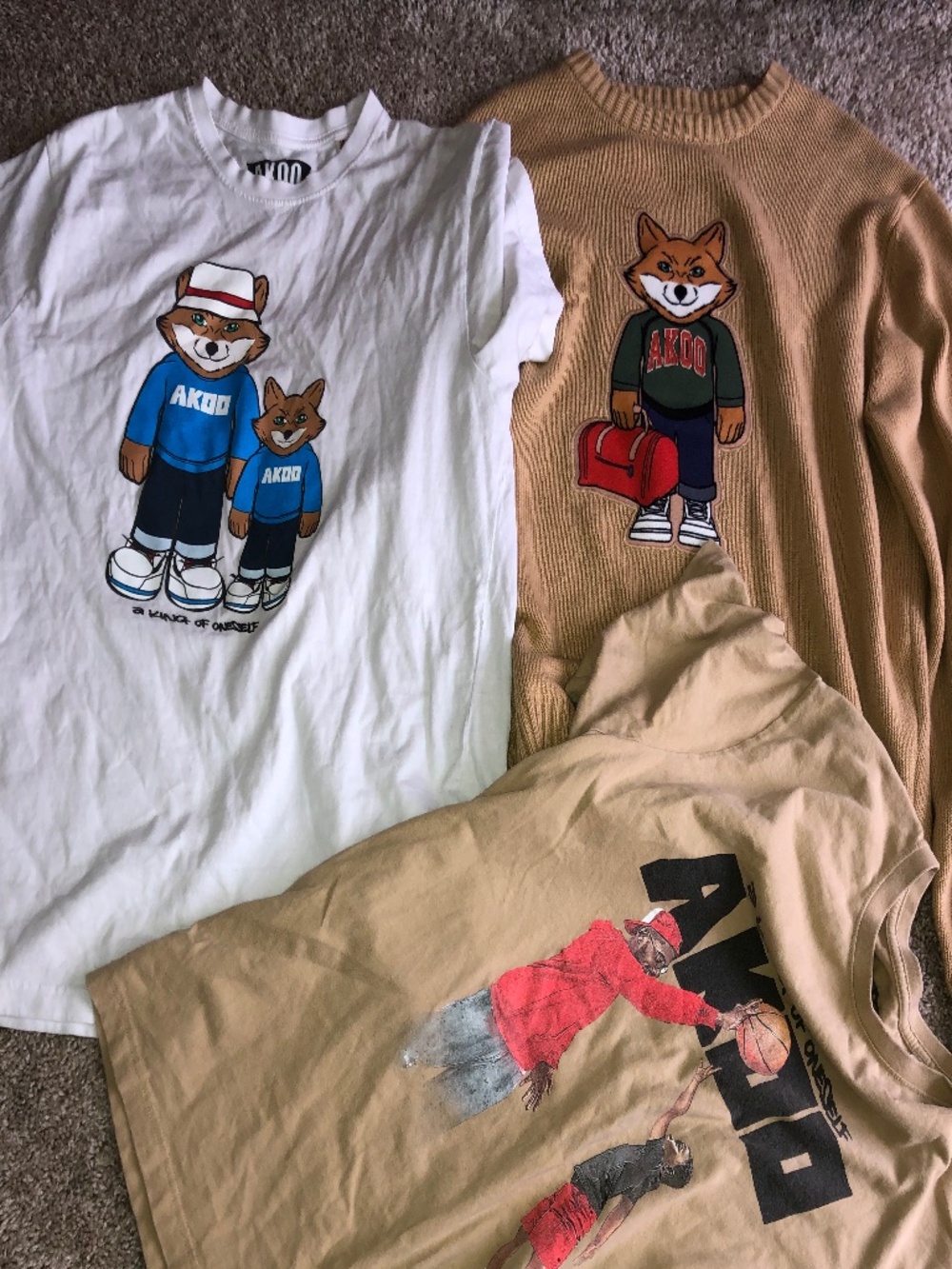1 akoo sweater 2 tee shirts